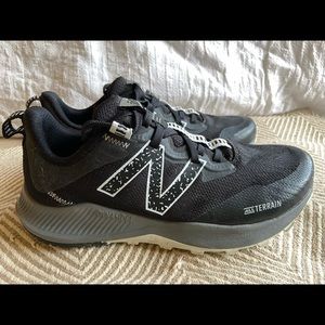 New balance all terrain sneakers.